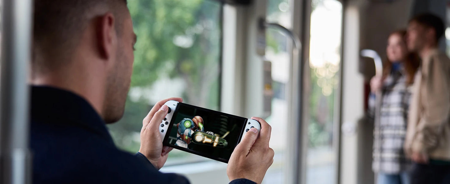 Nintendo Switch (OLED model) with White Joy-Con